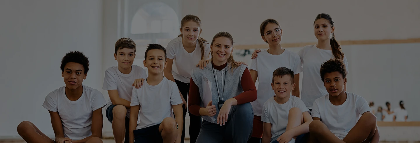 Young athlete training with coach